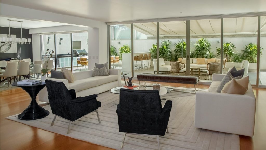 two black suede armchairs during daytime